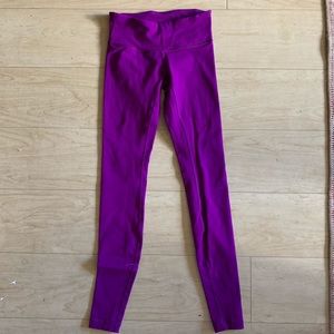 Bright purple Lululemon leggings